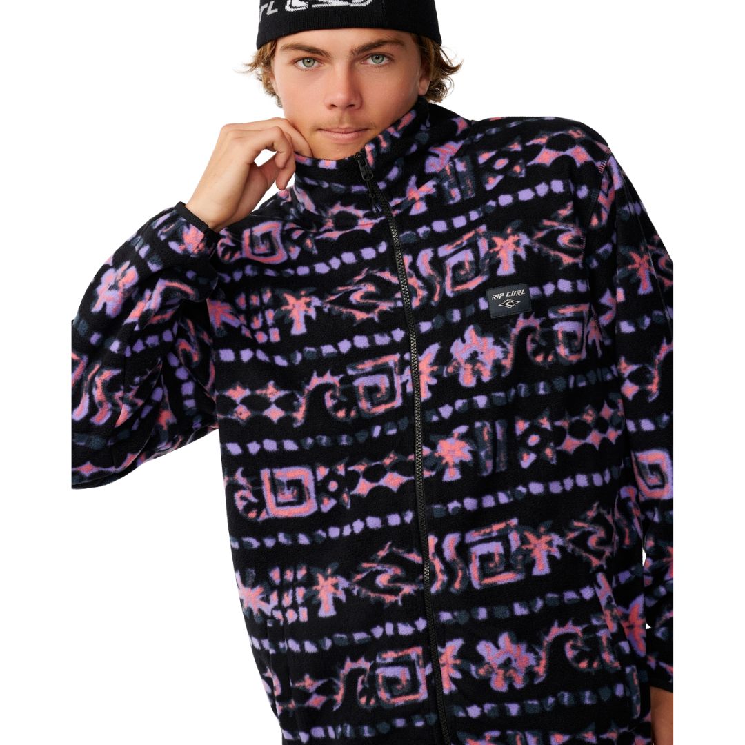 Detalle del cuello alto y la cremallera de la Rip Curl Sessions Polar Fleece en Black, con el badge Rip Curl cosido en el pecho.