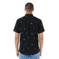 Rip Curl Skelly Breach camisa manga corta negra vista trasera con estampado tropical.