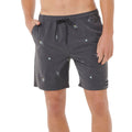 Bañador surf hombre Rip Curl Skelly Breach Volley negro, vista frontal tres cuartos con estampado yardage skelly surf, cordón negro y etiqueta Rip Curl.