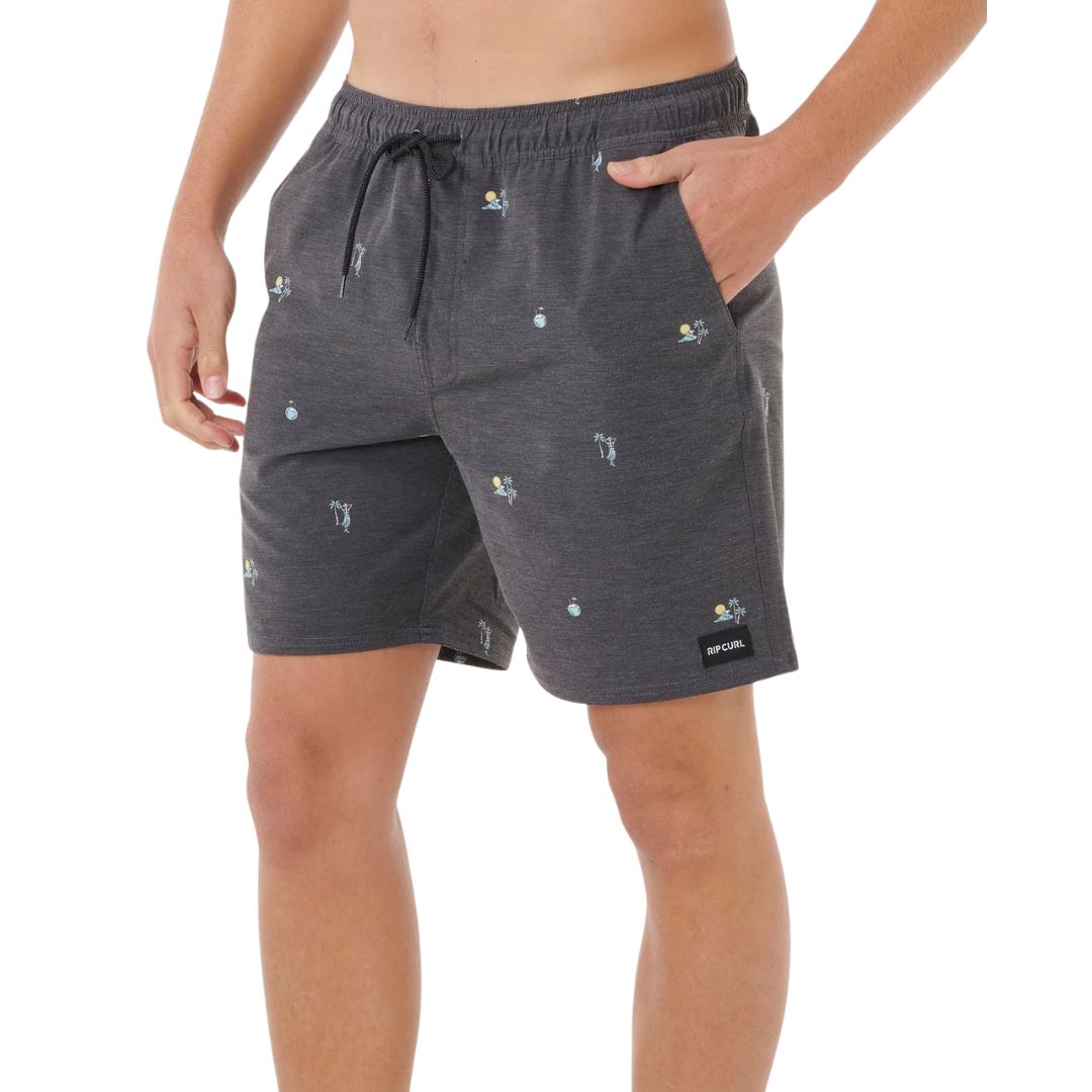 Bañador surf hombre Rip Curl Skelly Breach Volley negro, vista lateral con estampado yardage de esqueletos y palmeras, cordón negro y etiqueta Rip Curl.