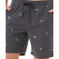 Detalle estampado yardage bañador Rip Curl Skelly Breach Volley negro, motivos skelly surf con esqueletos, palmeras y cocos en gris melange, cordón negro.