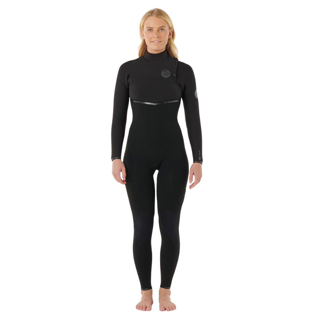 Rip Curl E-Bomb Zip Free 4/3 en color negro, traje de neopreno mujer visto de frente completo, con entrada sin cremallera y parche circular Rip Curl en el pecho.