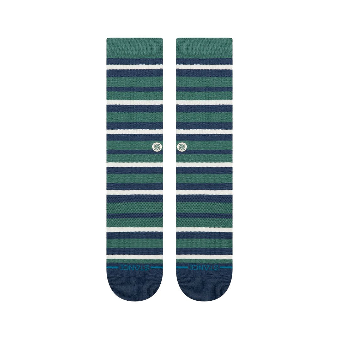 Stance Brett Crew teal, calcetines crew verde azulado con rayas horizontales azul marino y blancas y puntera azul marino reforzada.