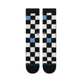Stance Chef Check Crew black, calcetines crew negros con diseño checker blanco y negro y detalle de cuadro azul.