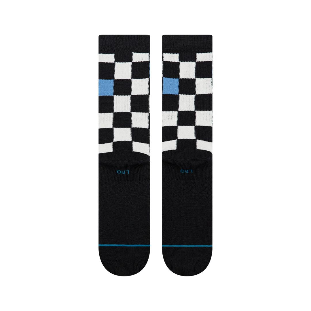 Stance Chef Check Crew negro vista trasera, calcetines crew a cuadros blanco y negro con logo circular bordado y puntera reforzada negra.