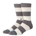 Calcetines Stance Nep Stripe Crew en tonos gris y blanco con acabado moteado, vista lateral en perspectiva.