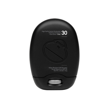 Protector solar Sun Bum Signature SPF 30 en stick facial, envase compacto de acabado negro mate con diseño minimalista