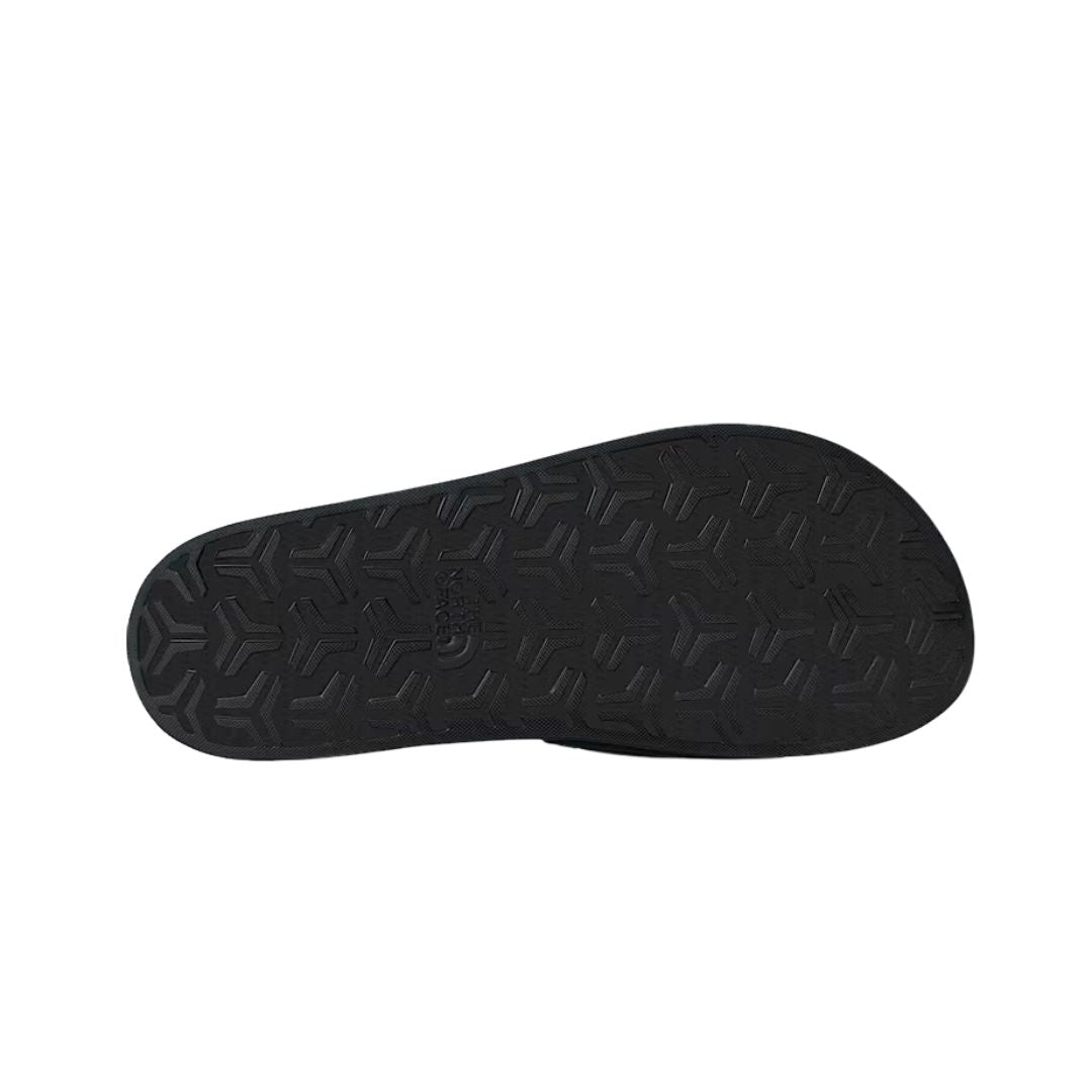 Suela texturizada de las chanclas The North Face Base Camp Slide III en color negro.