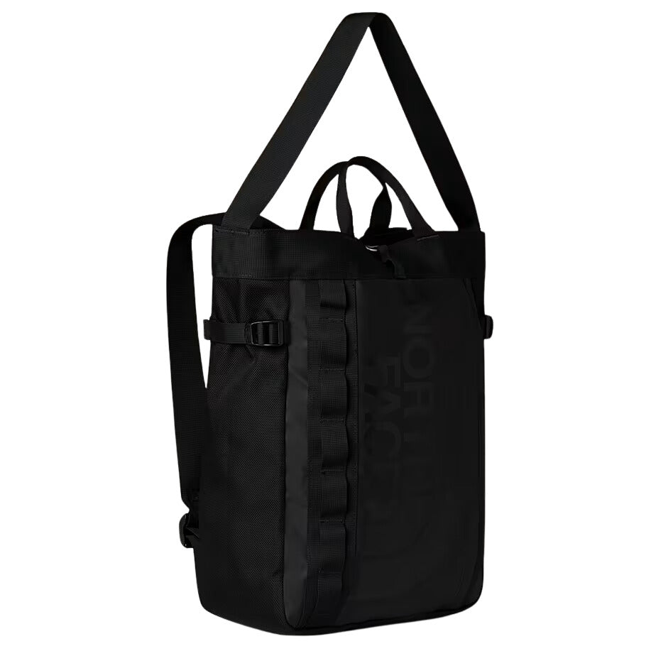 Vista lateral de la mochila The North Face Base Camp Tote Pack en color negro.