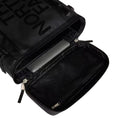 Mochila The North Face Base Camp Fuse Box negra abierta, mostrando funda acolchada para portátil.