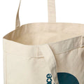 Interior del bolso The North Face Cotton Tote en color natural con logo azul, asas largas para llevar al hombro