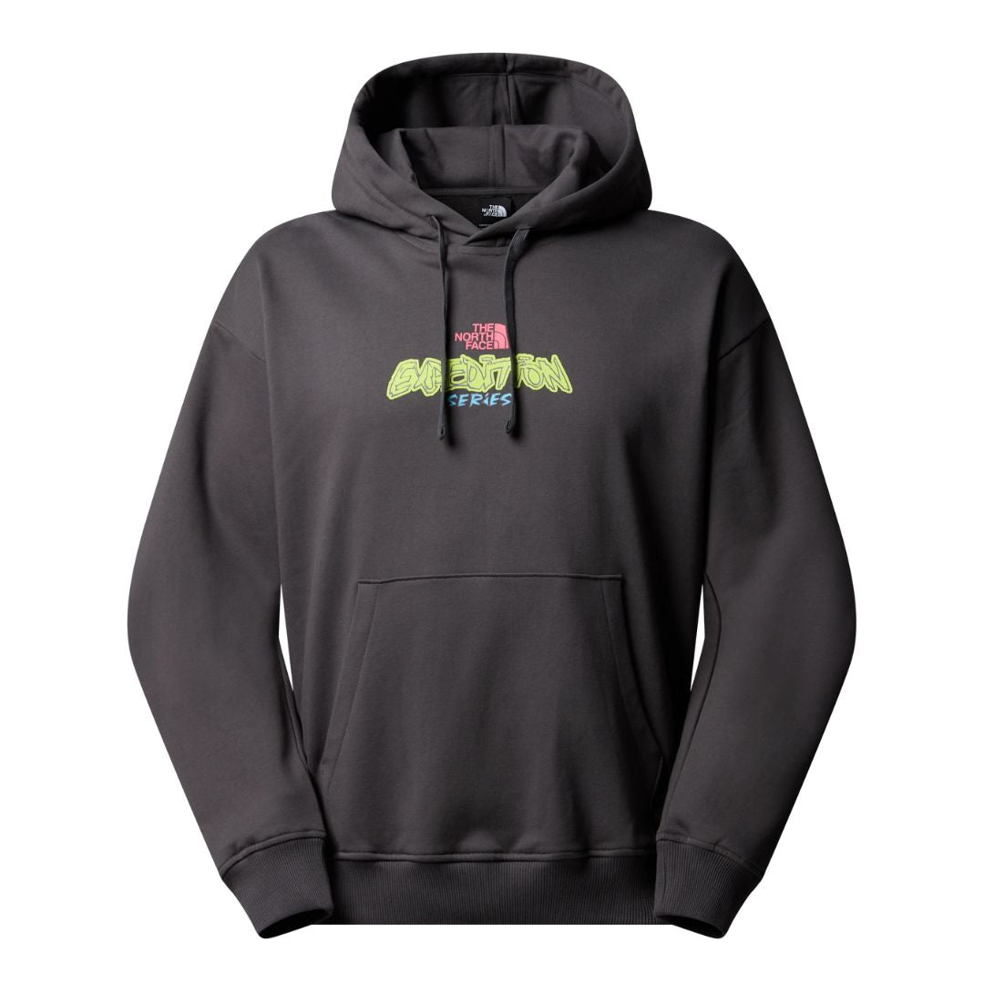 The North Face Expedition Celebration Oversized Hoodie color gris antracita, vista frontal con logo gráfico en el pecho.