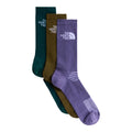 Pack de 3 calcetines The North Face Multi Sport Cushion en verde botella, oliva y malva, plegados mostrando la zona de ventilación mesh y el refuerzo de sujeción central en el par malva.