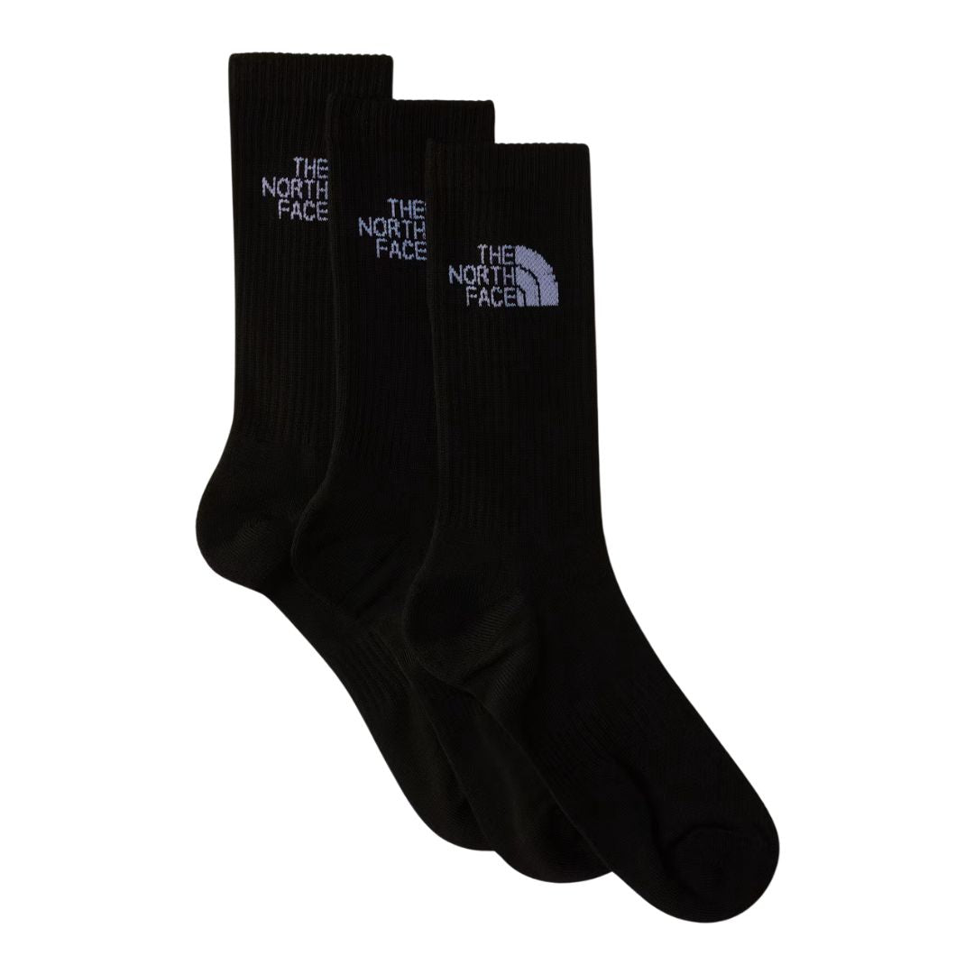 Pack de 3 calcetines The North Face Multi Sport Cushion en negro, estirados y superpuestos mostrando el logo bordado en gris claro en cada puño.