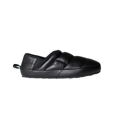 Perfil lateral de las zapatillas The North Face ThermoBall Traction Mule LTR Slip-On en color TNF Black.