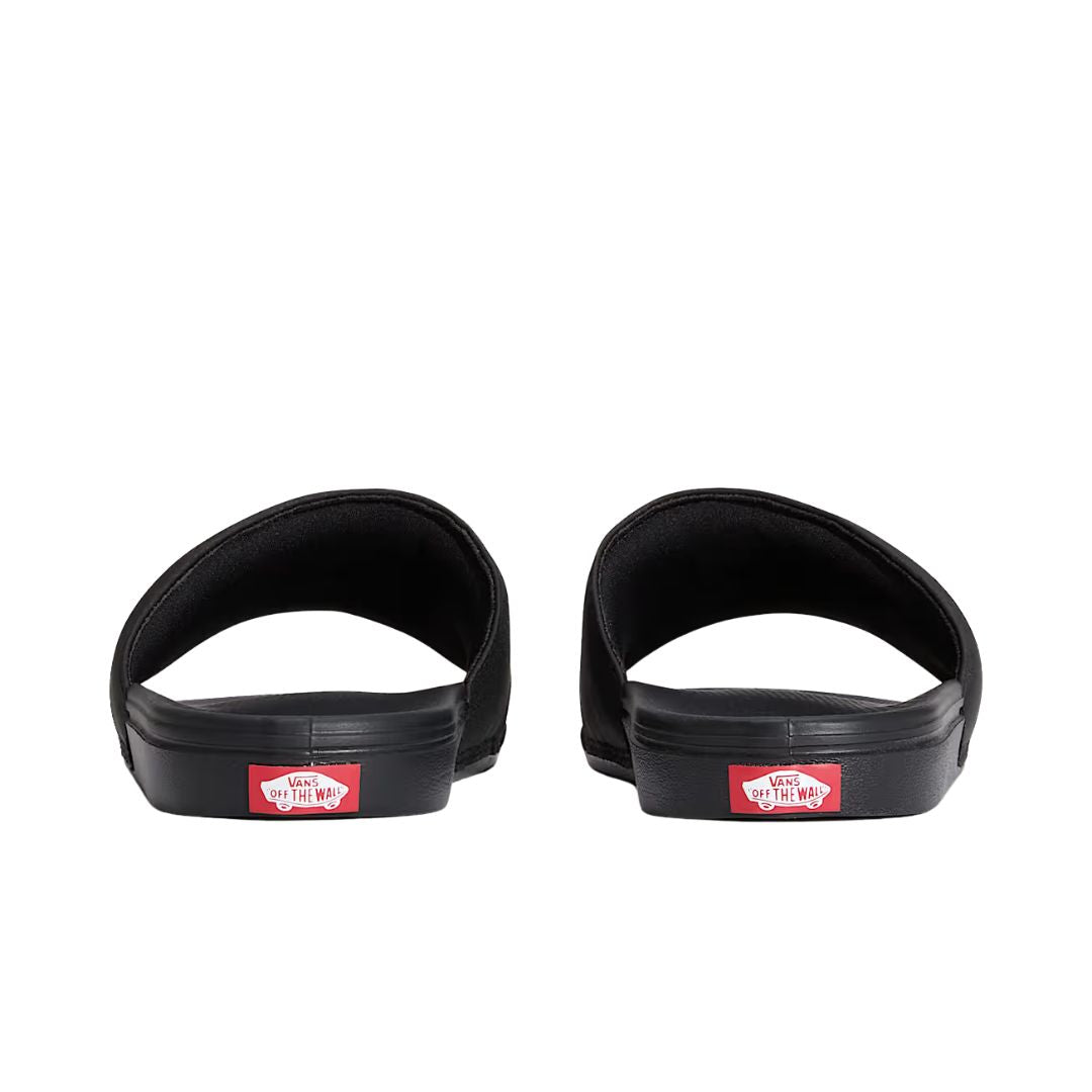Vista trasera de las chanclas Vans La Costa Slide-On en color Vans Black con detalle Off The Wall.