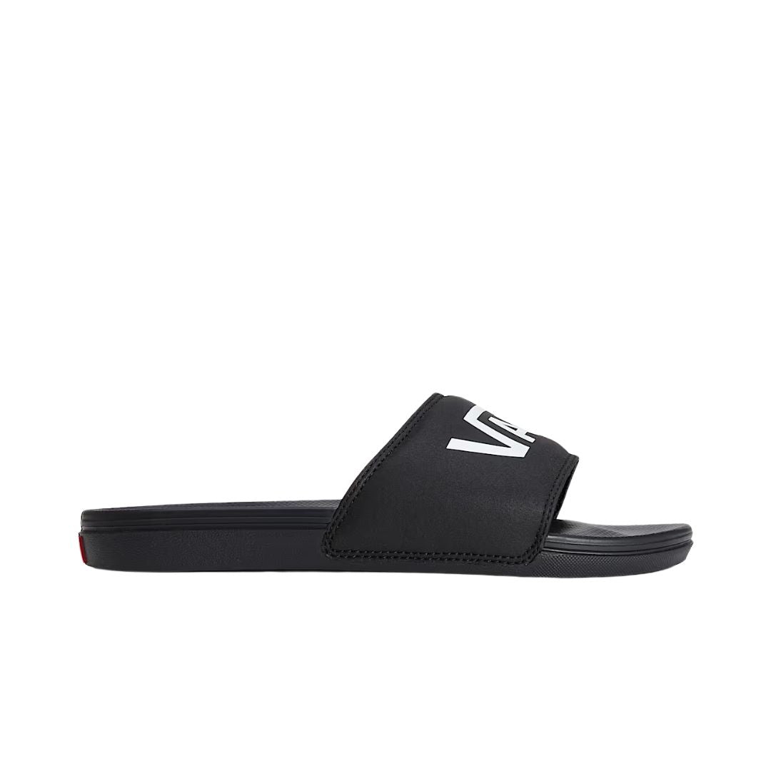 Chancla Vans La Costa Slide-On en color Vans Black, vista lateral izquierda con tira ancha y suela plana.