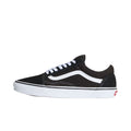 Zapatillas Vans Old Skool Black White vista lateral exterior en negro con Sidestripe blanca, cordones blancos y suela waffle color caramelo.