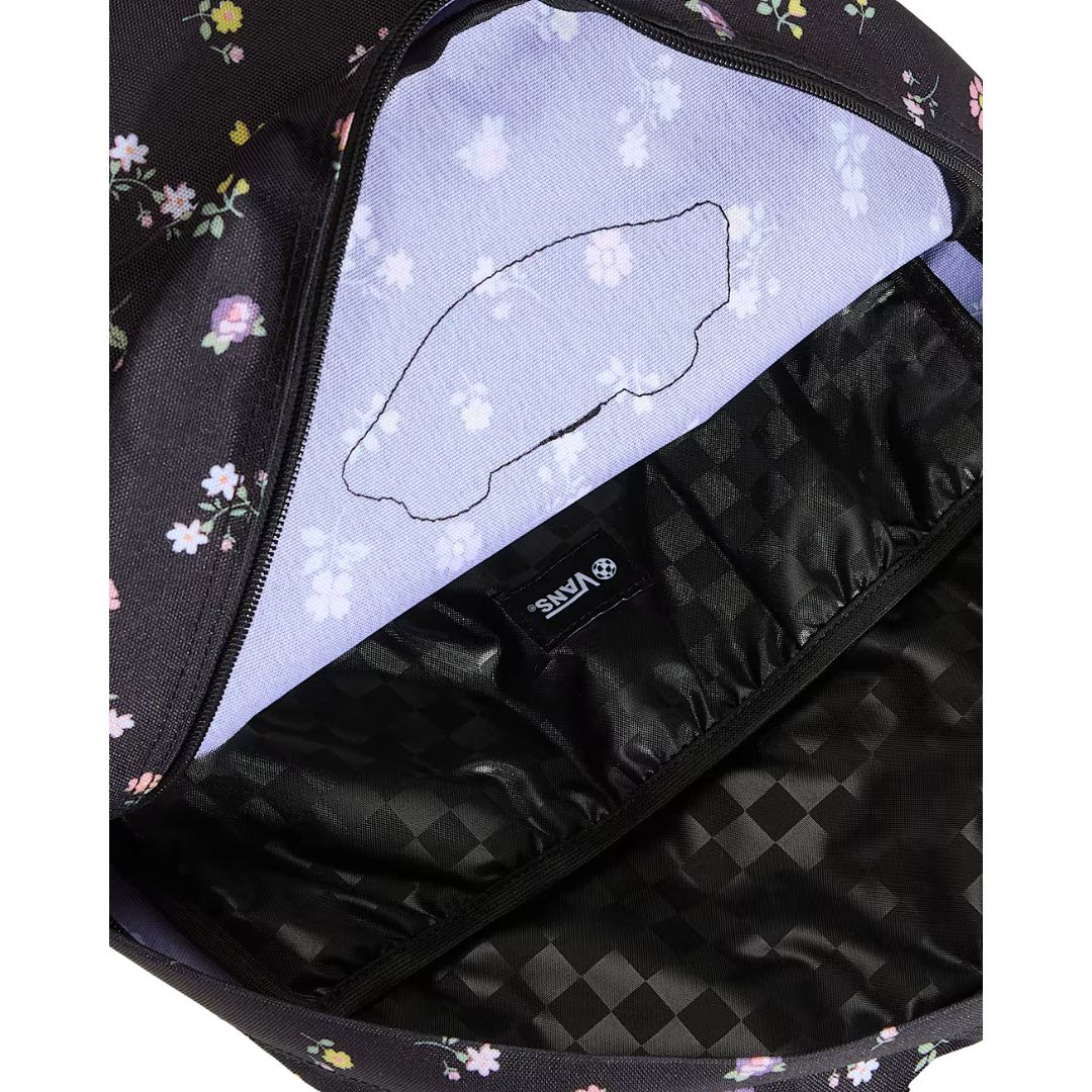 Mochila Vans Old Skool Classic en color black floral, compartimento principal abierto, mostrando el forro interior y el bolsillo interno con logo VANS.