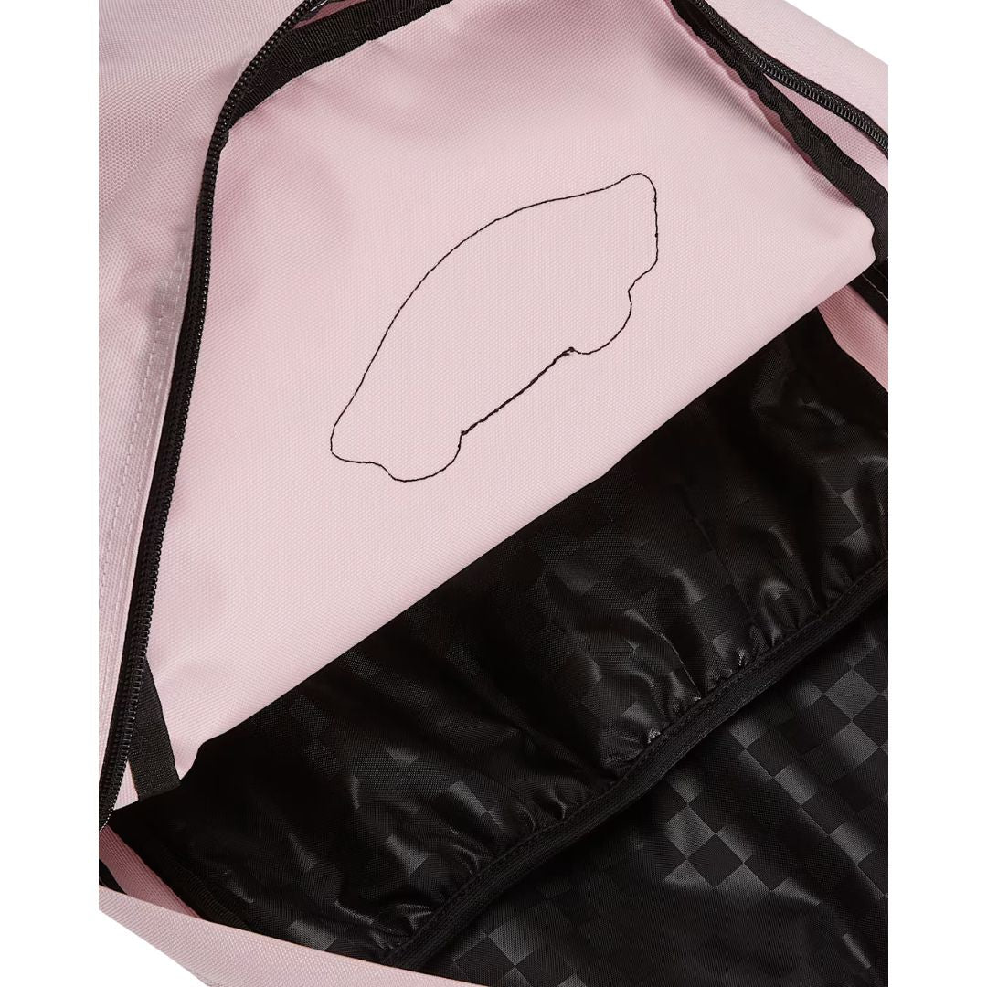 Mochila Vans Old Skool Classic en color pale pink, compartimento principal abierto, mostrando el interior en el mismo tono rosa y el forro a cuadros negro.