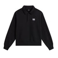 Vans Polo Fleece Pullover en negro, jersey tipo polo de felpa para hombre, vista frontal con cuello abotonado, logotipo Vans bordado en el pecho y acabado lavado en prenda.