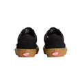 Parte trasera de las zapatillas Vans Skate Old Skool black gum mostrando el logo Off The Wall.