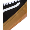 Detalle lateral de las zapatillas Vans Skate Old Skool color black gum mostrando refuerzo DURACAP en la suela.