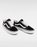 Zapatillas Vans Skate Old Skool Negras con la suela blanca y cordones blancos