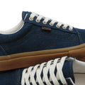 Detalle lateral de Vans Skate Old Skool color Blue Denim con costuras y etiqueta.