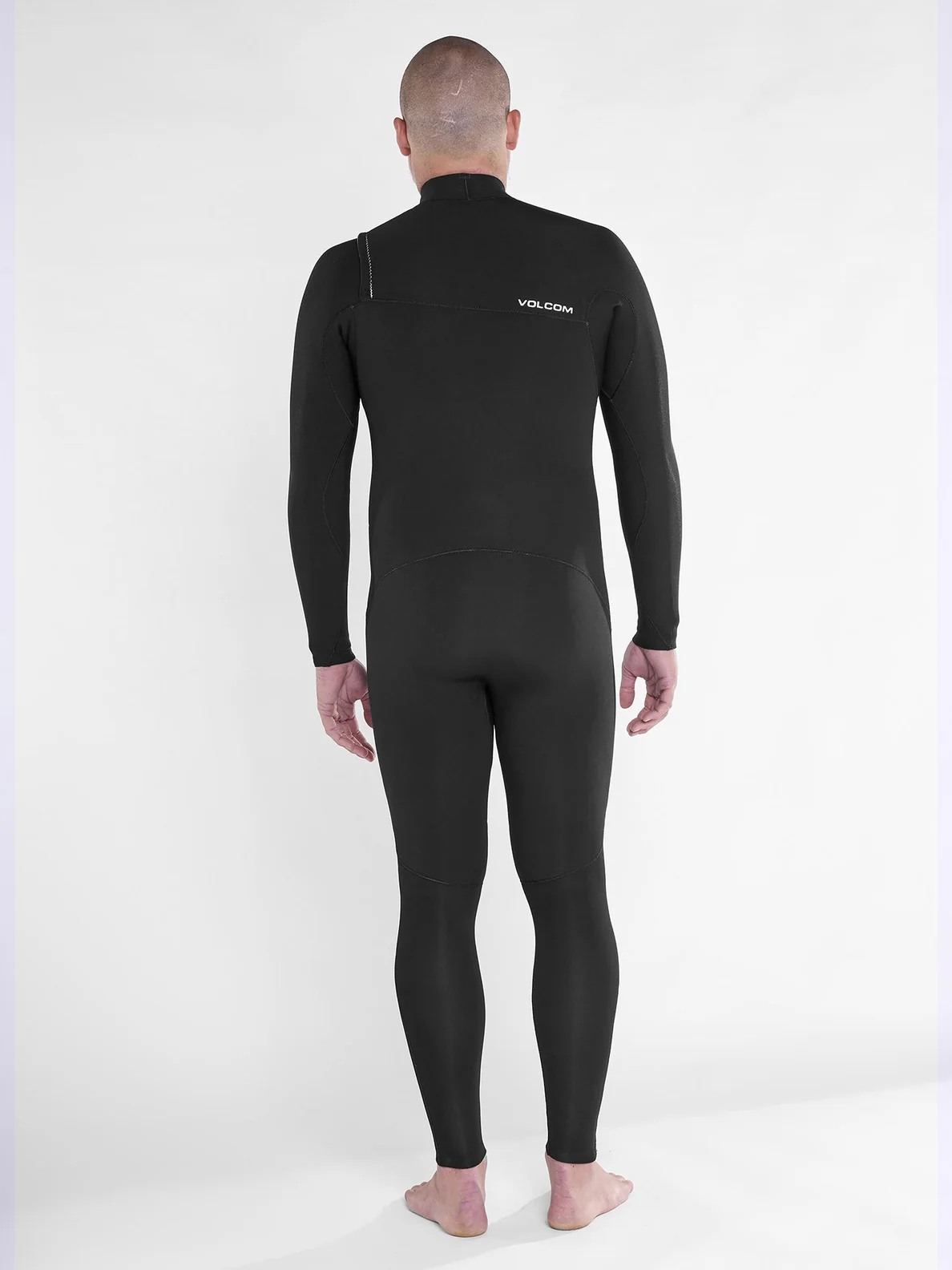 Hombre con Traje de neopreno con cremallera en el pecho Volcom 4/3mm Chest Zip Fullsuit espalda