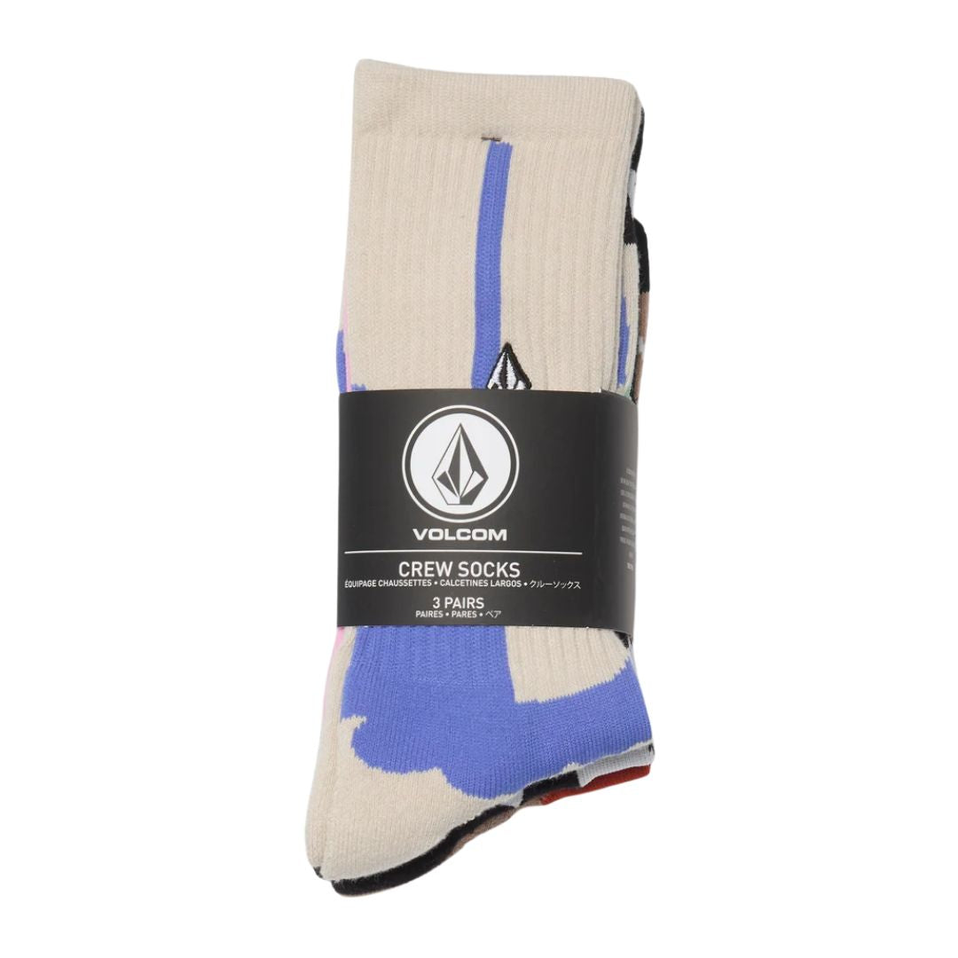 Pack de calcetines Volcom Carrau Print Mixer Sock plegado con la etiqueta original Volcom Crew Socks 3 Pairs, mostrando el estampado pastel de Antonio Carrau.