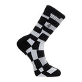 Calcetín Volcom Carrau Print Mixer Sock en estampado geométrico blanco y negro, vista de perfil con el logo de la piedra Volcom bordado en la caña.