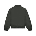 Chaqueta Volcom Damerman en color negro lavado fotografiada en plano de producto sin modelo, vista trasera mostrando el cuello alto y el corte relaxed.
