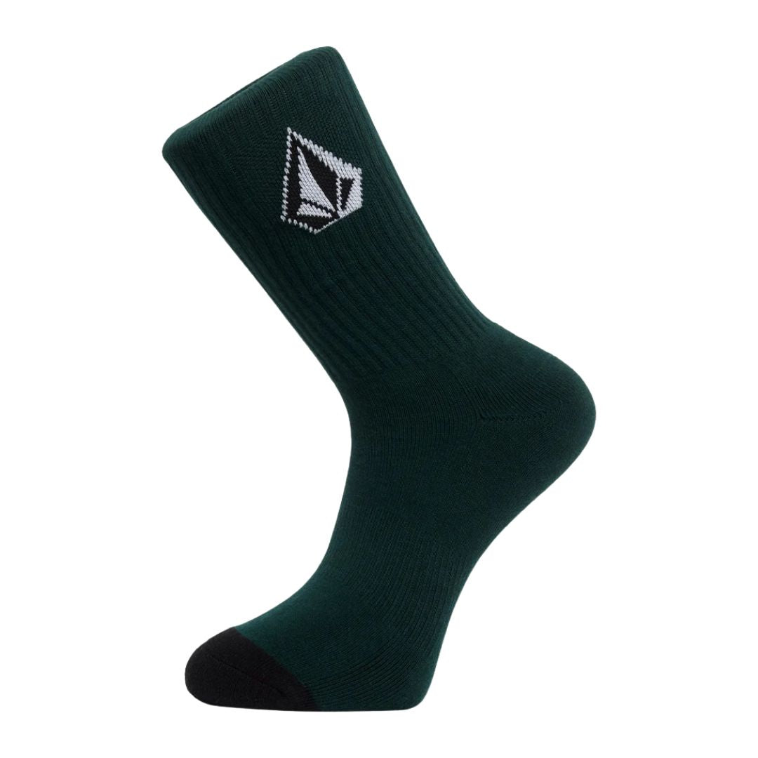 Calcetín Volcom Full Stone Mix Sock 3P en color verde, vista de perfil mostrando el logo de la piedra Volcom tejido en la caña y la puntera negra.