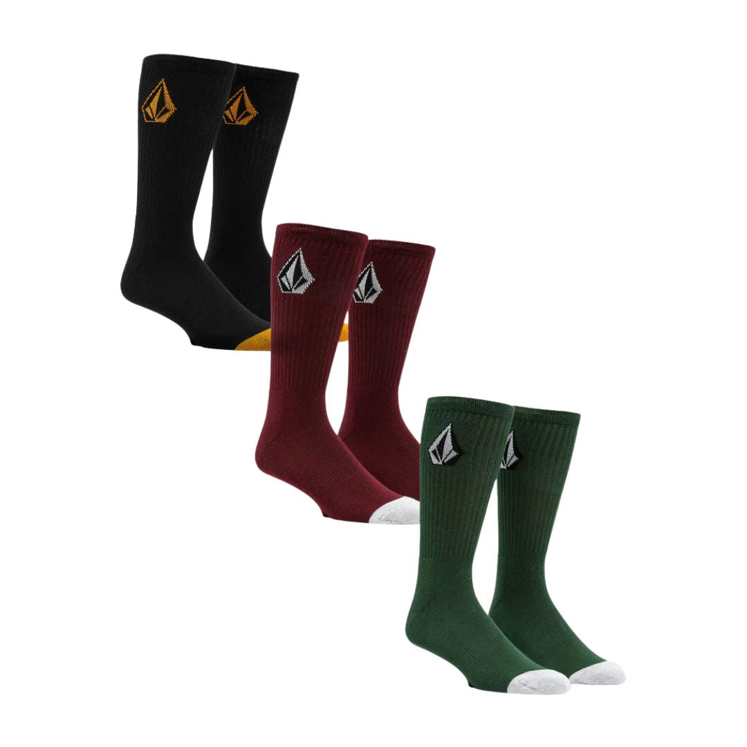 Pack de tres pares de calcetines Volcom Full Stone en colores negro con puntera amarilla, burdeos con puntera gris y verde con puntera gris.