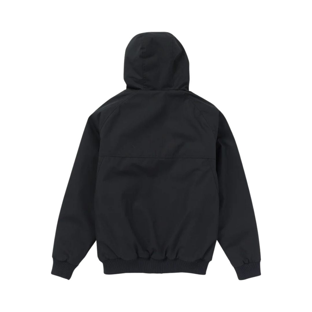 Chaqueta Volcom Hernan 10K negra, vista trasera en plano sobre superficie blanca.