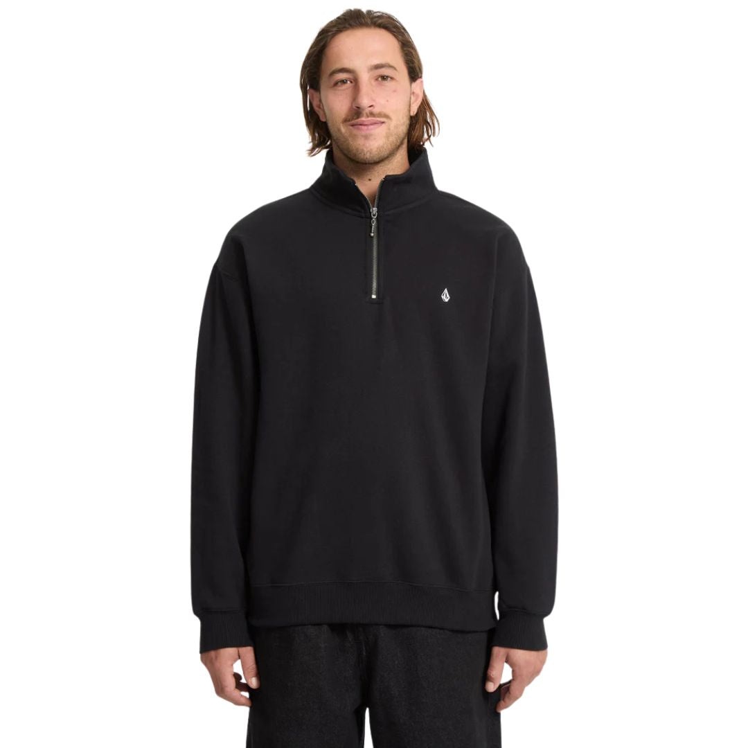 Sudadera Volcom Single Stone Quarter Zip negra para hombre, vista frontal con cremallera abierta a media altura.