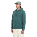 Sudadera Volcom Single Stone Zip Riffle Green vista lateral con capucha, cierre frontal y bolsillo canguro.