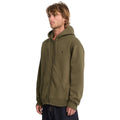 Sudadera con cremallera VOLCOM SINGLE STONE ZIP color verde sage leaf vista frontal en modelo masculino.