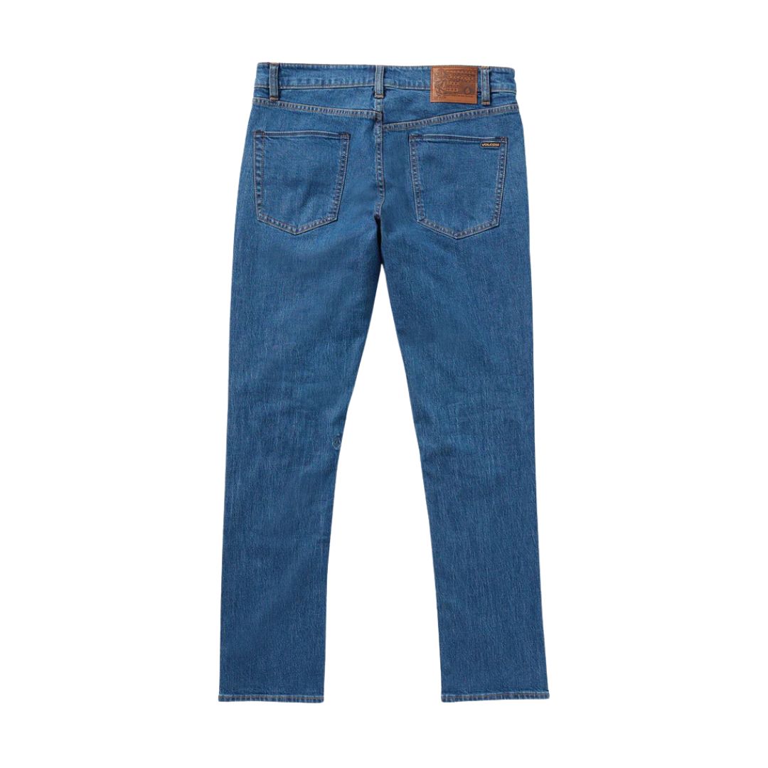 Volcom Solver Denim Bold Blue vaquero hombre vista trasera producto aislado.