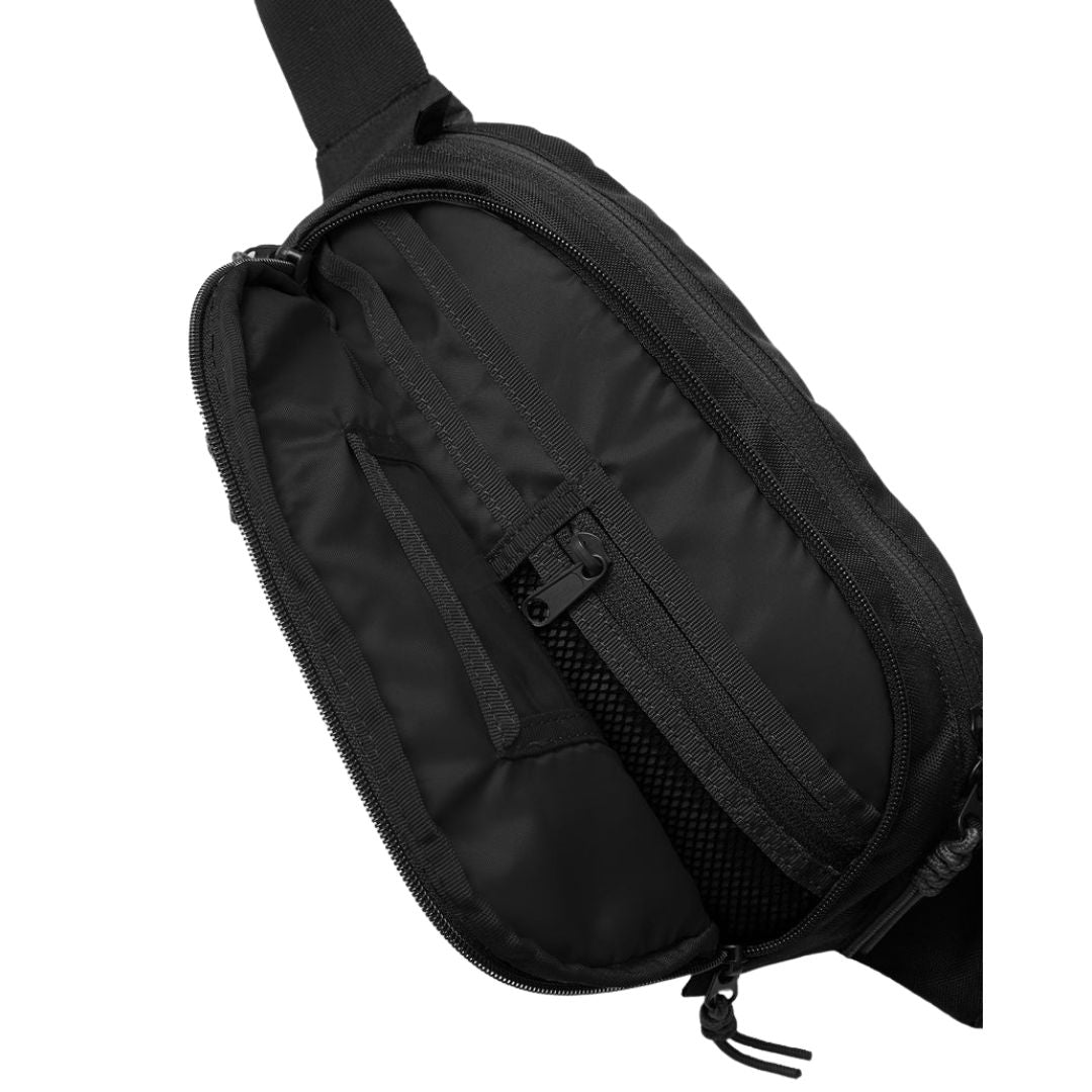 Volcom Waisted Pack riñonera negra vista frontal minimalista con logo Stone.