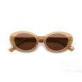 Gafas de sol Warmouth Grunge Brown vistas desde arriba plegadas, montura ovalada de acetato marrón arena con lentes TAC polarizadas marrones.