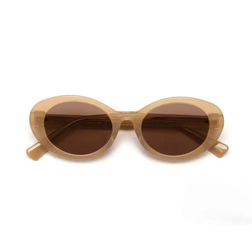 Gafas de sol Warmouth Grunge Brown vistas desde arriba plegadas, montura ovalada de acetato marrón arena con lentes TAC polarizadas marrones.